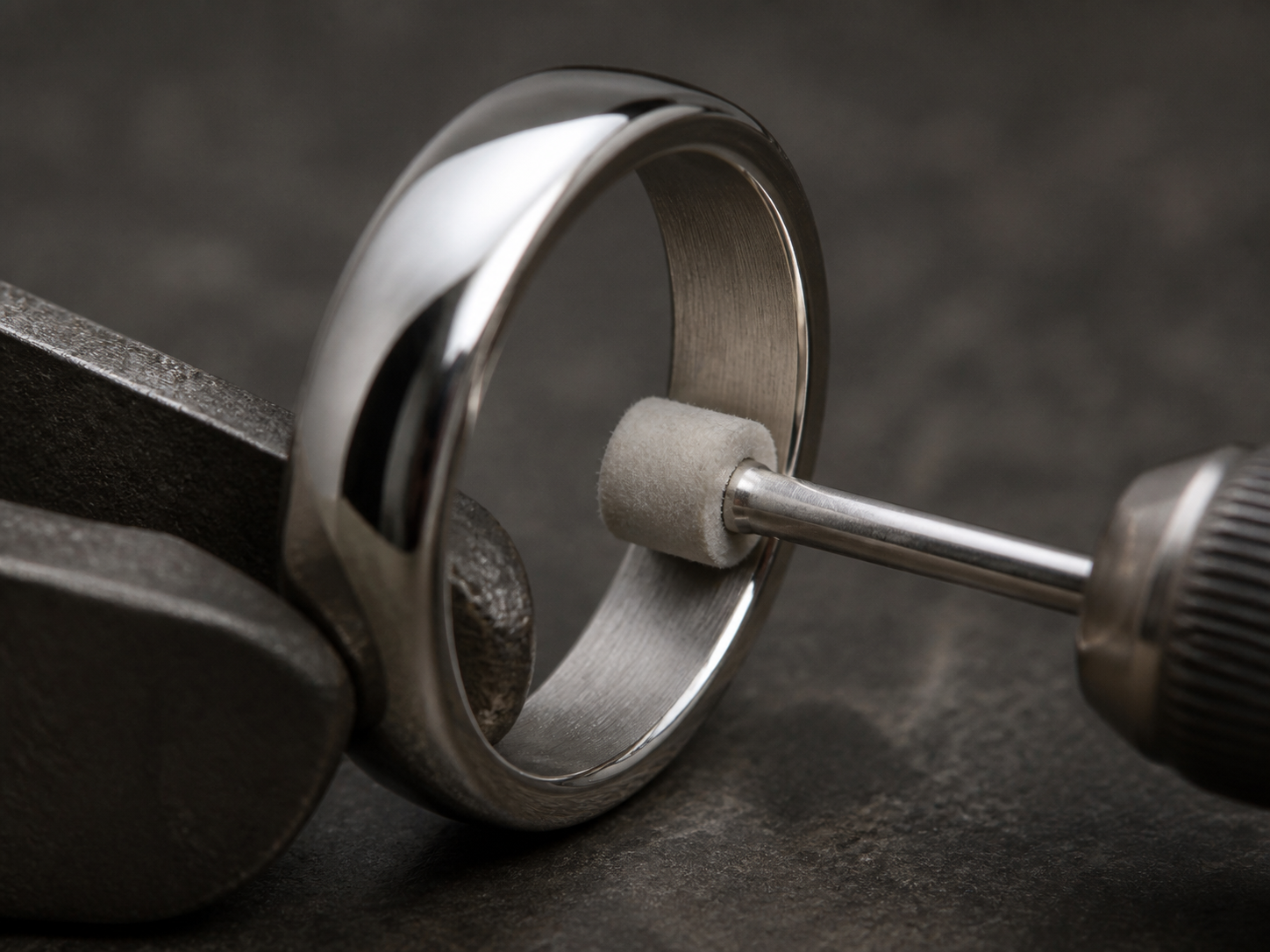 A stopped small finishing tool beside a matte inner ring band and bright outer edge.