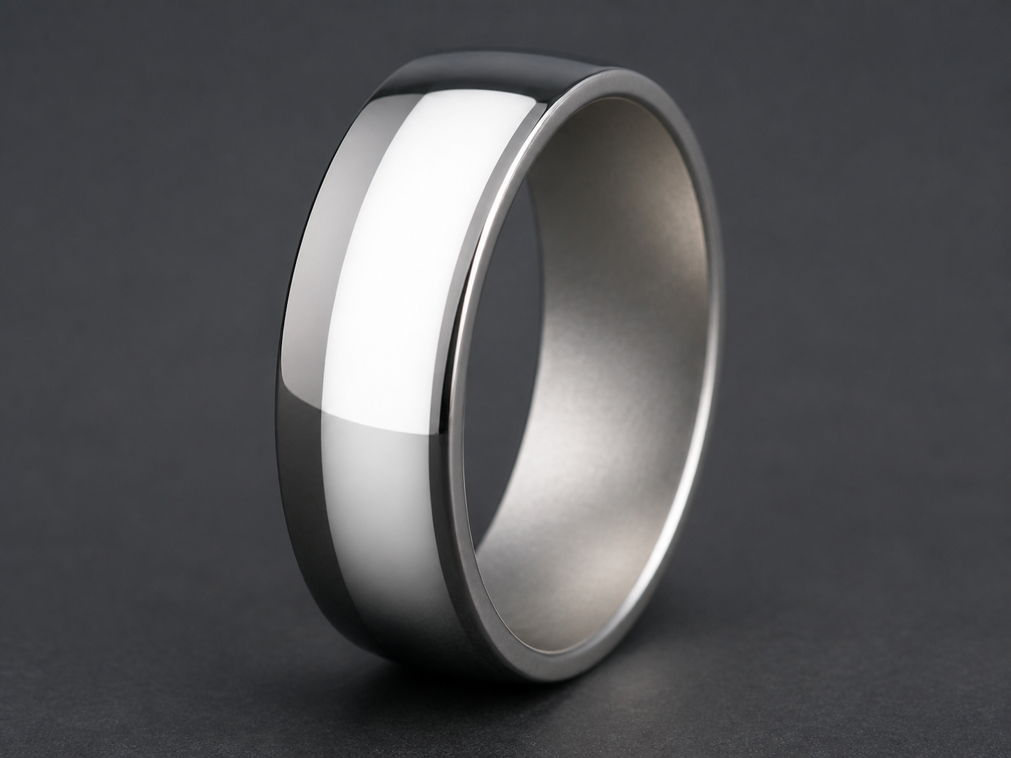 One ring showing a mirror-bright outer wall and a visibly dull inner wall.