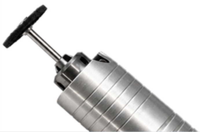 Rotary handpiece with small polishing disc close-up
