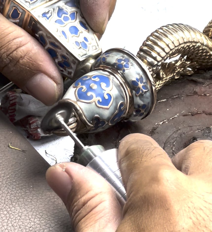 Detail polishing of an ornamental piece with a small rotary tool