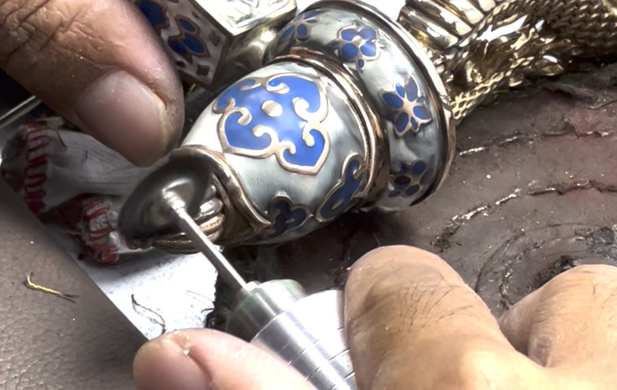 Detail polishing of an ornamental piece with a small rotary tool